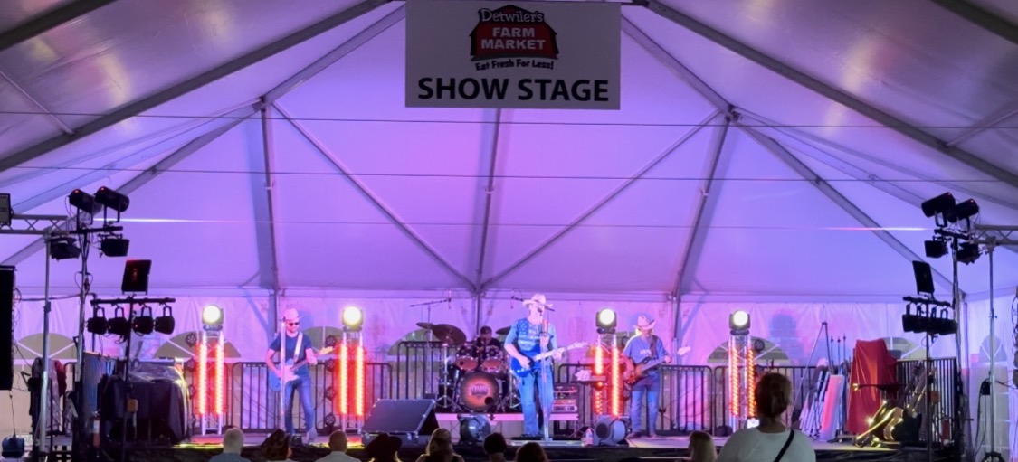 Professional stage sound and lighting production at a live event